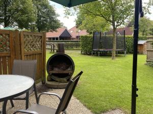 Reihenhaus in Strackholt mit beheiztem Pool