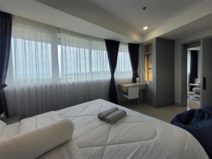 Apartment Nuvasa Bay Nongsa, Kalani 1BR 12th, Sea & Golf View