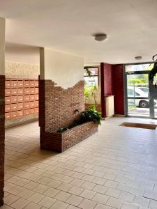 Appartements Apparemment spacieux T5 : photos des chambres