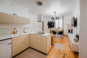 Appartements RoomChic - Les Ambassadeurs : photos des chambres