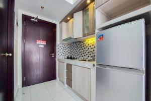Homey and Best Choice Studio 16th Floor Casa De Parco Apartment By Travelio