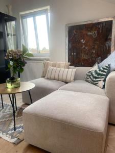 En SMUK og CHARMERENDE OASE meget tæt på centrum!