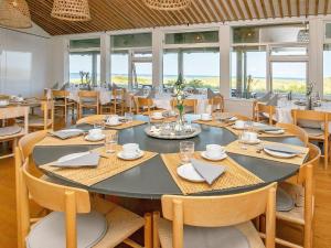 6 person holiday home on a holiday park in Sæby