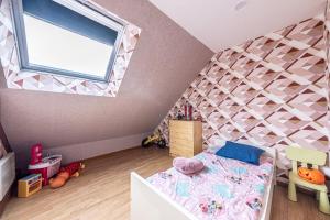 Appartements Maison Proche Disney/Paris : photos des chambres