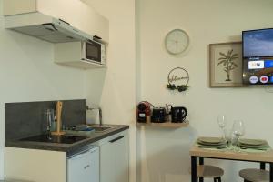 Appartements CitizenHouse Anzin - 4 Studios - 15 a 36m2 - Jardin - Terrasse - Acces autonome - WiFi - Netflix : photos des chambres