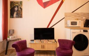 Appartements La maison des artistes plein centre familiale : photos des chambres