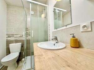Appartements L-Eveche lumineux et zen : photos des chambres