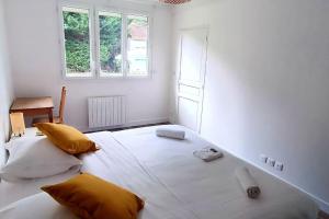 Appartements Charmant 2 pieces entre Disneyland et Paris avec jardin : photos des chambres