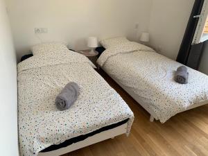 Appartements Appartement neuf, vue sur saone : photos des chambres