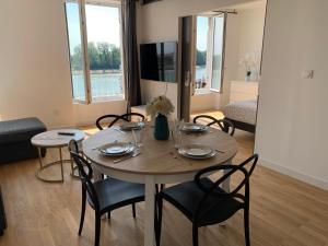 Appartements Appartement neuf, vue sur saone : photos des chambres