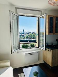 Appartements Le Cocon au bord de la mer : photos des chambres