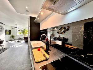 Appartements Epinappart avec terrasse : photos des chambres