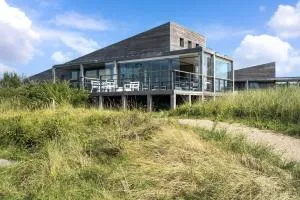 Modern Panorama Villa - 4p - Glazen Serre, Waterzicht & Comfort - Villa 36 - Ouddorp