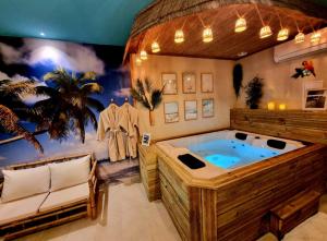 Appartements Les Spas de la Mer, Appart&Spa Aloha, 100m de la plage, Plein coeur du Grau : photos des chambres