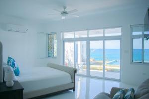 The W Villa 5 BR Oceanfront w Staff