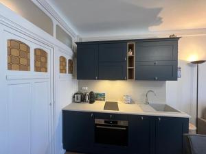 Appartements Charmant studio au centre du Mont-Dore, bien equipe, max 2 pers - FR-1-608-273 : photos des chambres