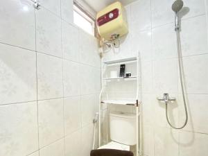 Simply Homey 2BR at Suites @Metro Apartment By Travelio