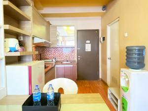 Simply Homey 2BR at Suites @Metro Apartment By Travelio