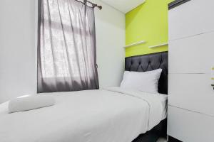 Gorgeous and Homey 2BR Serpong Garden Apartment By Travelio