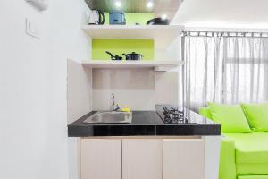 Gorgeous and Homey 2BR Serpong Garden Apartment By Travelio