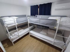 Giường trong Phòng ngủ tập thể cả Nam và Nữ 4 Người (Bed in 4-Bed Mixed Dormitory Room)