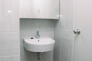 Homey and Minimalist Studio at Vasanta Innopark Apartment By Travelio