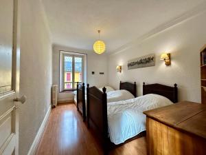 Appartements Evasion Authentique - Centre ville - Jeux de societe : photos des chambres