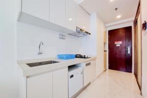 Fancy and Nice Studio at 20th Floor Sky House BSD Apartment By Travelio