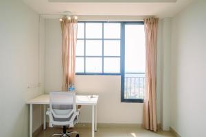 Simply Look Studio at Evenciio Margonda Apartment By Travelio