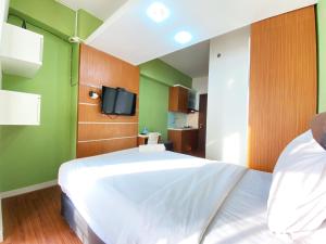 Warm Studio Apartment at Harvard Jatinangor By Travelio