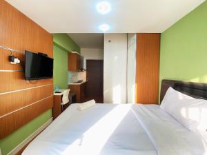 Warm Studio Apartment at Harvard Jatinangor By Travelio
