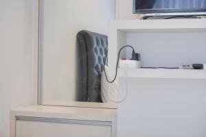 Strategic and Well Designed Studio Apartment at Capitol Park Residence By Travelio