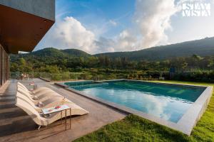 StayVista at The Glen with Private Pool, Jacuzzi & BBQ