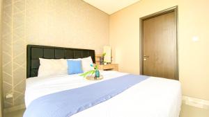 Well Designed and Strategic 2BR at Ciputra International Apartment By Travelio