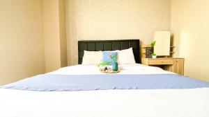 Well Designed and Strategic 2BR at Ciputra International Apartment By Travelio