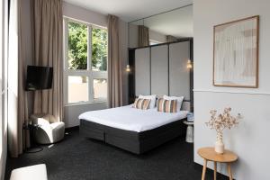 Deluxe Suite room in Golden Tulip Keyser Breda Centre