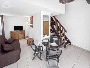 Maisons de vacances Duplex lumineux avec terrasse pres des plages : photos des chambres