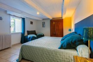Maisons de vacances Le Viguier - Maison avec terrasse vue montagne : photos des chambres