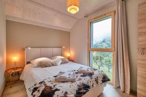 Chalets L-Ecrin de Venosc piscine privee : photos des chambres