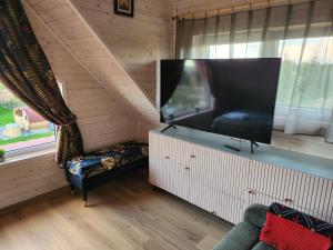 Dom nad jeziorem Dadaj w Kojtrynach