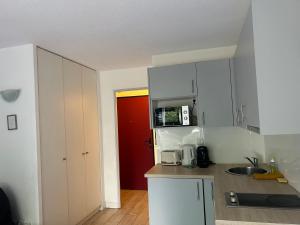 Appartements Le Charmant - 10 min Disney - 3 min Gare : photos des chambres