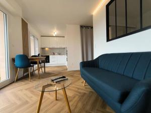 Appartements Agreable Studio Chantilly avec balcon et parking securise : photos des chambres