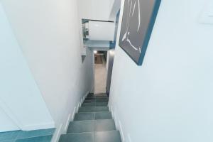 Appartements Confort & Style pres de CDG : photos des chambres