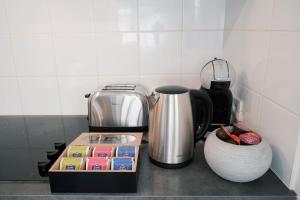 Appartements Confort & Style pres de CDG : photos des chambres