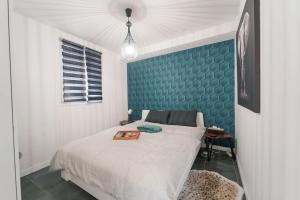 Appartements Confort & Style pres de CDG : photos des chambres