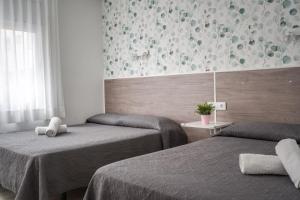 Family Room (2 Adults + 2 Children) room in Hotel Tolosa