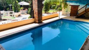 Maisons de vacances Studio Au Clos Saint Georges , piscine et Spa : photos des chambres
