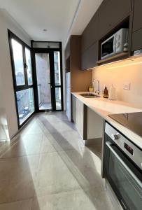 Espectacular 2amb Playa Grande con Balcon y Cochera - B