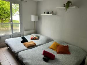 Appartements Le Charmant - 10 min Disney - 3 min Gare : photos des chambres