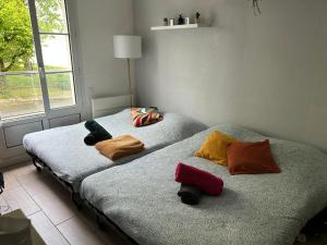 Appartements Le Charmant - 10 min Disney - 3 min Gare : photos des chambres